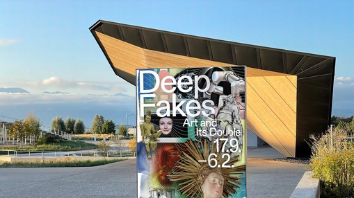 Deep Fakes poster in front of Pavilion A, EPFL Pavilions